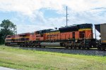 BNSF and KCS shove hard on the rear of a northbound coal train 